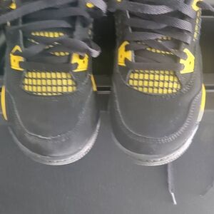 Jordan 4 yellow black used kids fair condition.